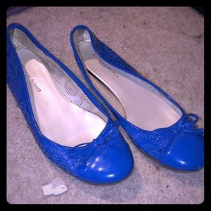 Etienne signer blue flats with perforated design